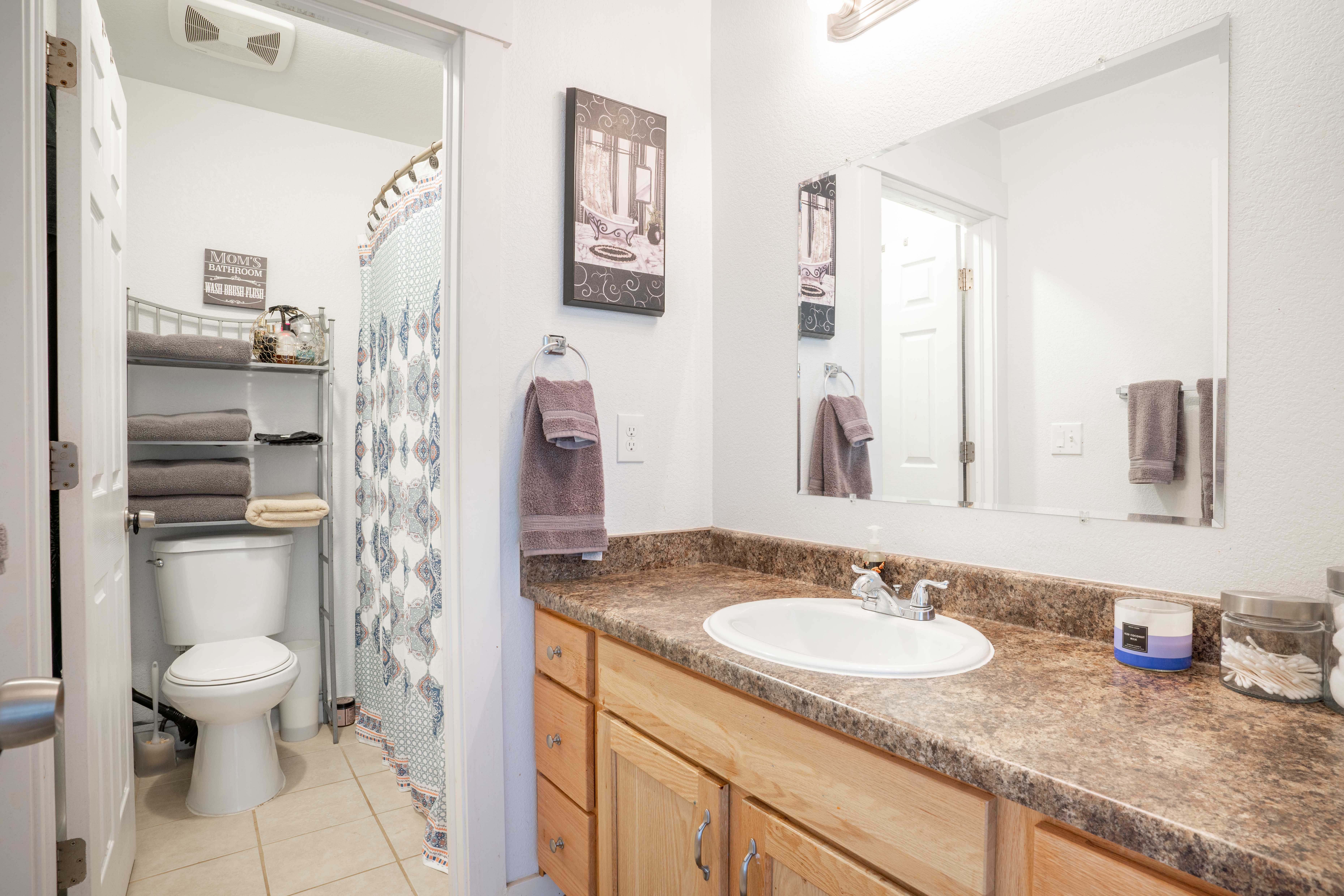 582 Avalon Ave, Lafayette - bathroom vanity looking on to separate toilet room