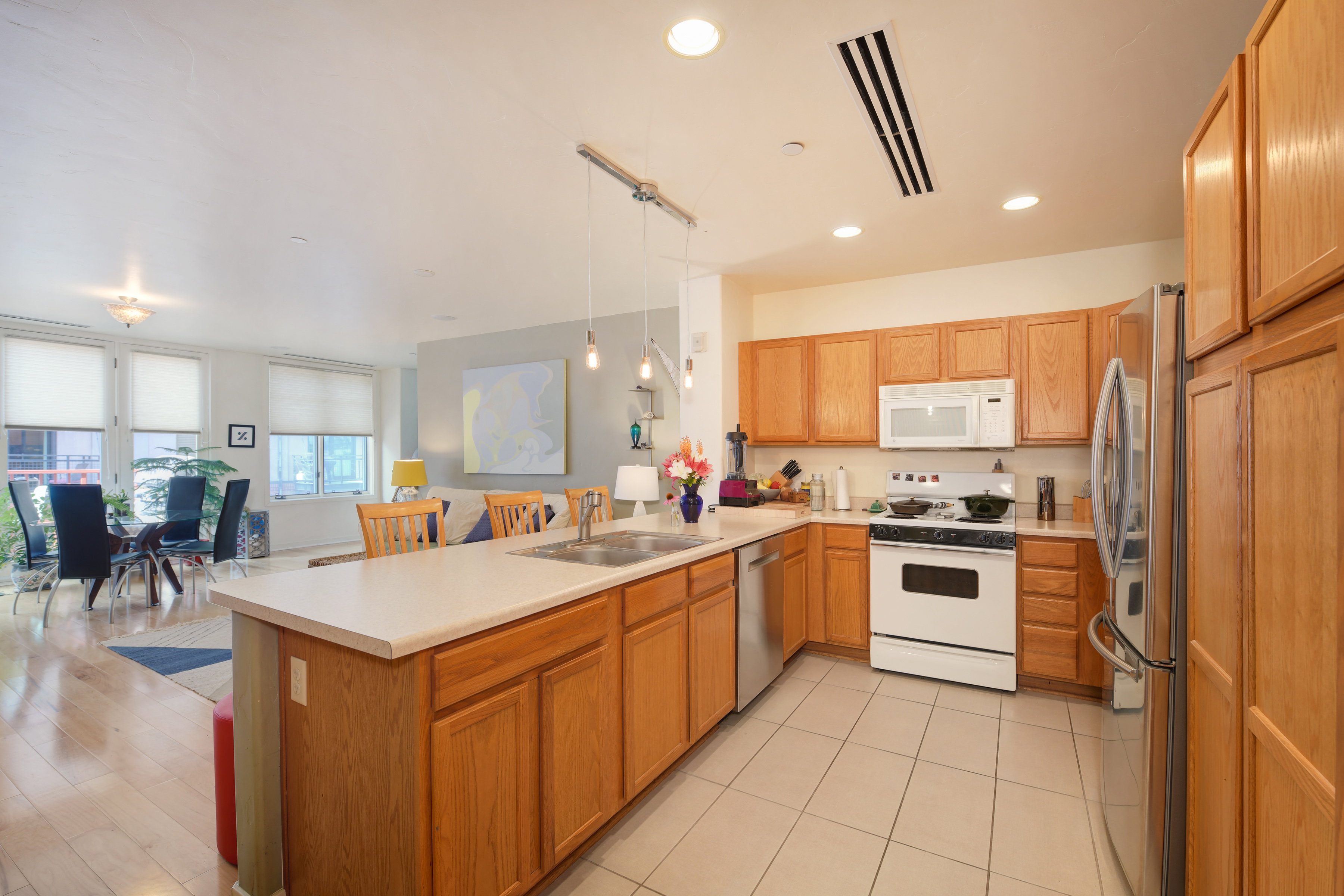 1301 Canyon Blvd Unit 205-05-kitchen looking on to dining & living