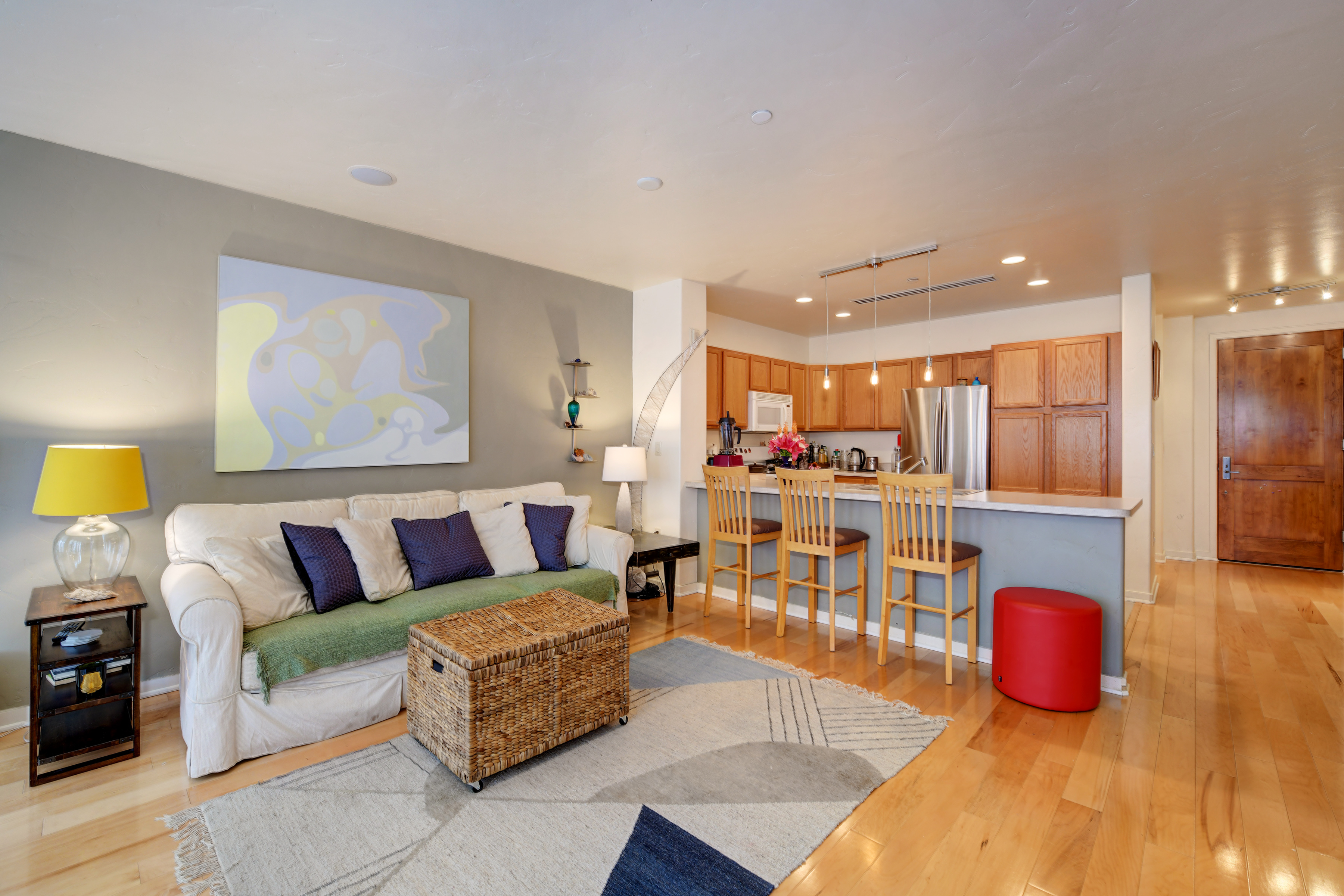 1301 Canyon Blvd Unit 205-08-living room looking onto kitchen and entry