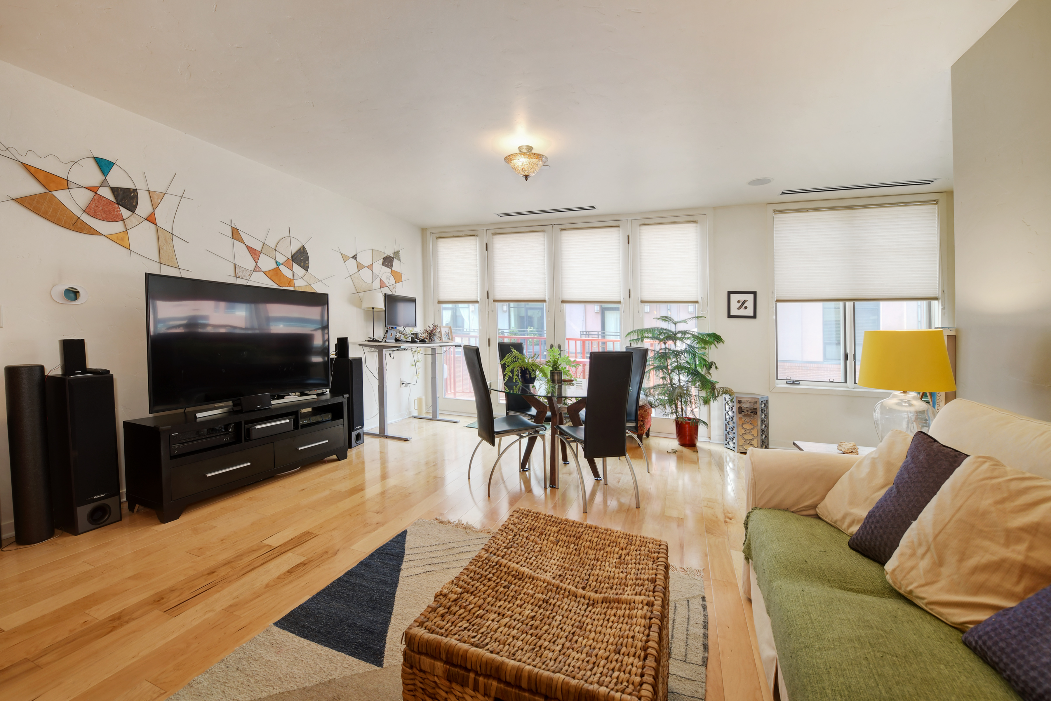 1301 Canyon Blvd Unit 205-10-living room looking onto dining and balcony