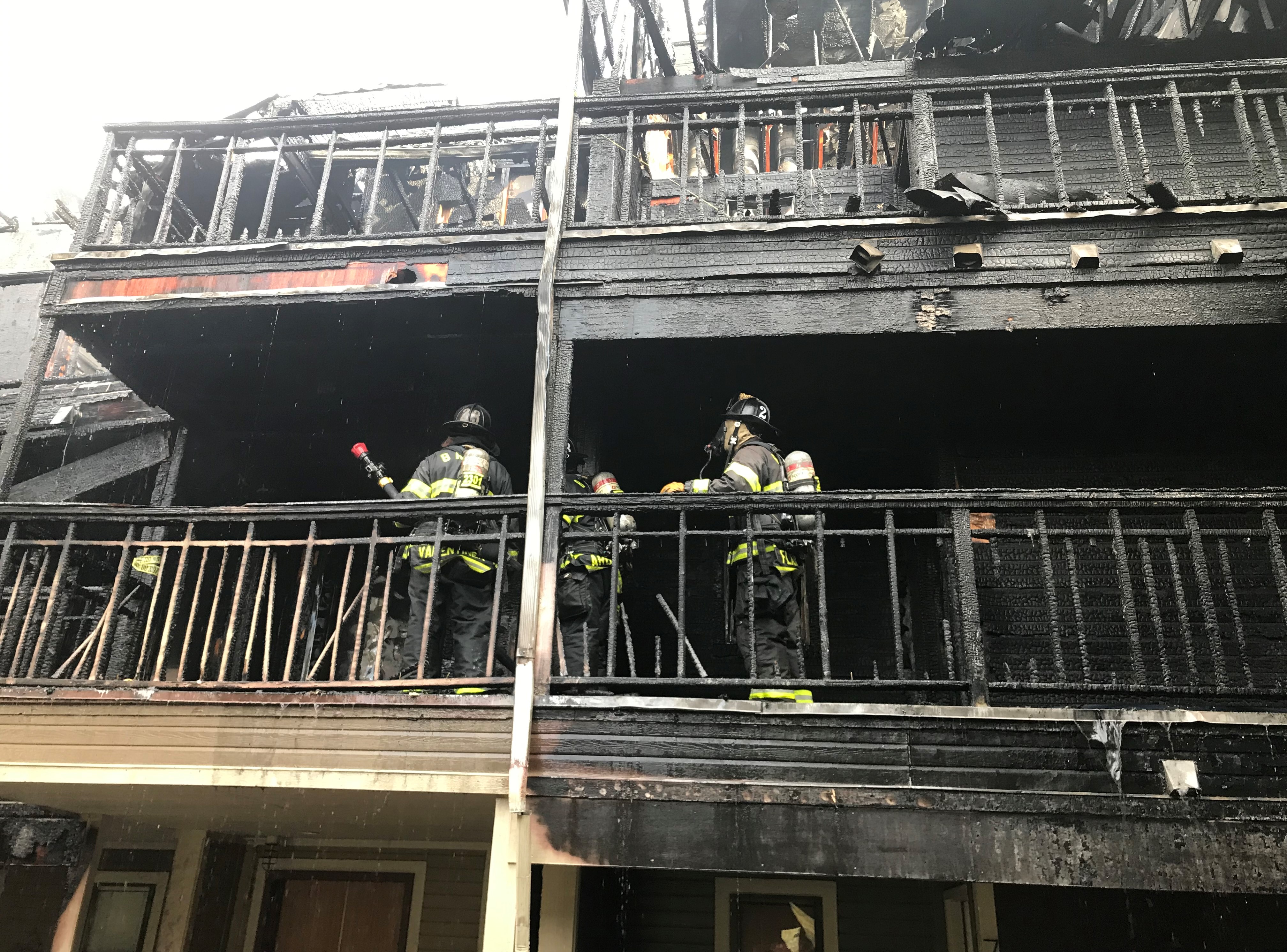 Firefighters on second level of apartment complex fire