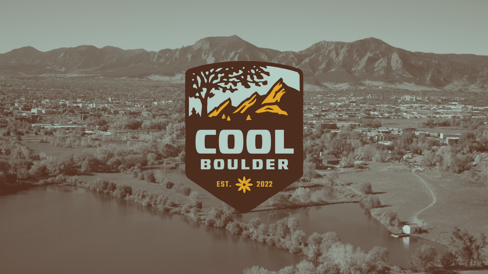 Cool Boulder logo placed on an aerial photo of the Boulder valley