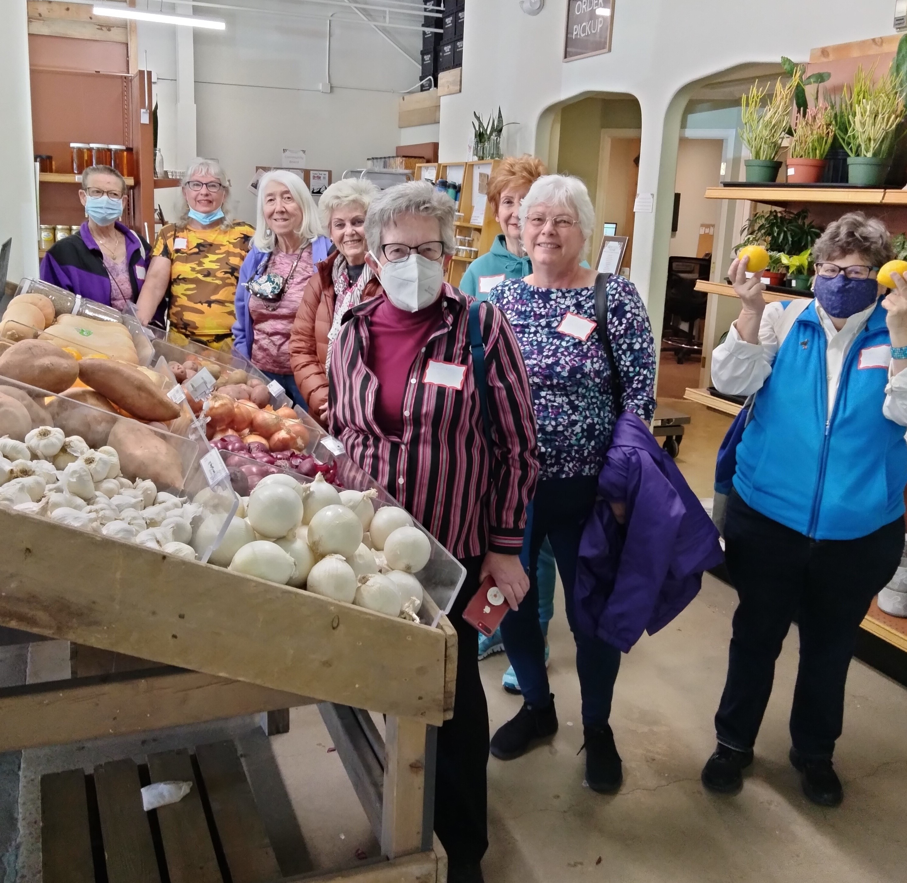 Older adults touring Nude Food Market