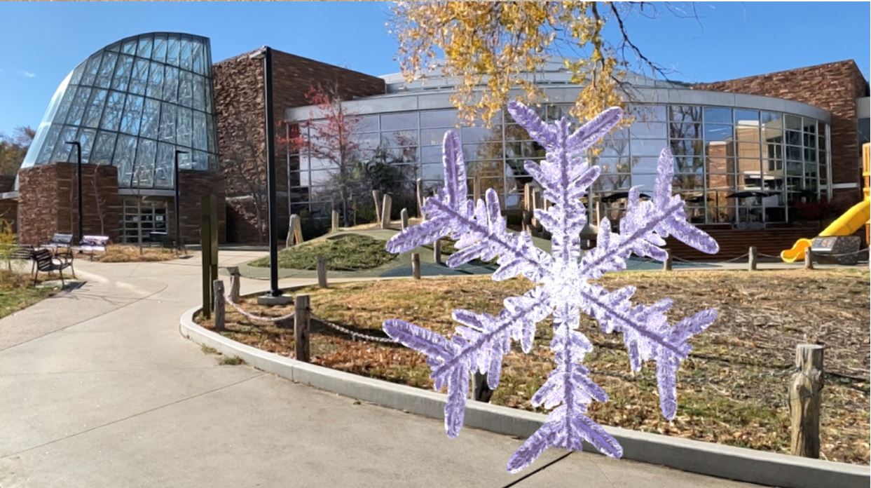 Augmented Reality Snowflake in front of Boulder Public Library building 