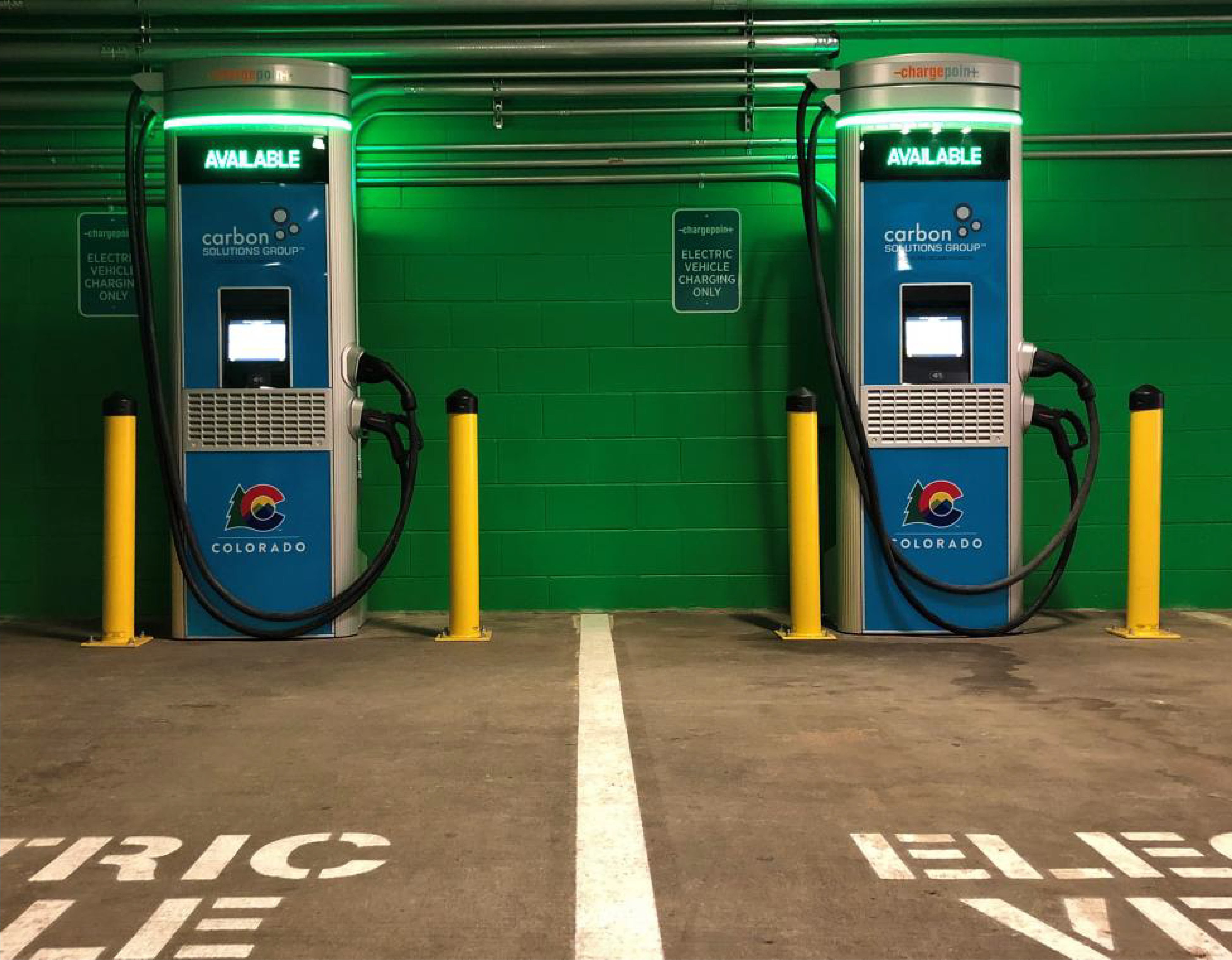 Electric vehicle chargers in a parking garage downtown