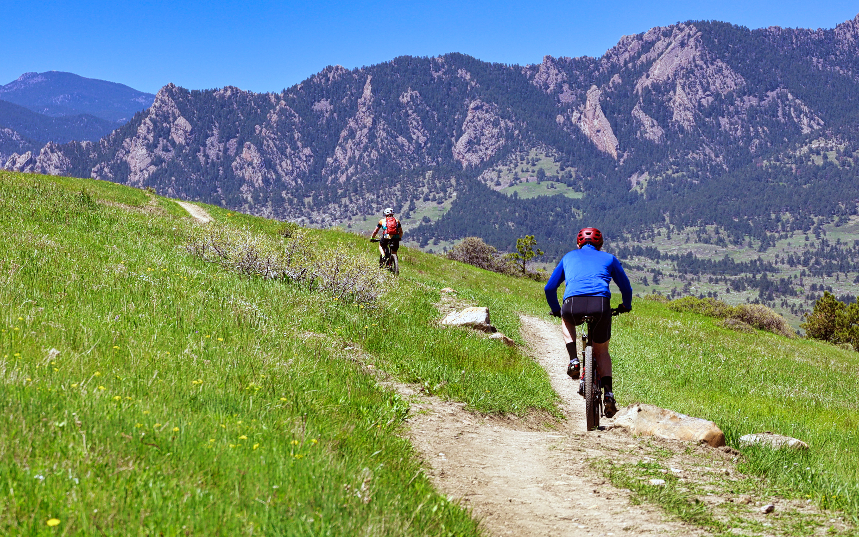 Two Bicyclists on Trail in Boulder Colorado