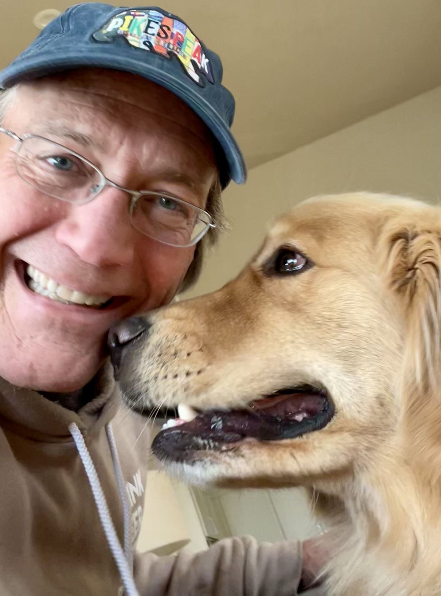OSMP Dog Ambassador, Roger Mathis, and his golden retriever