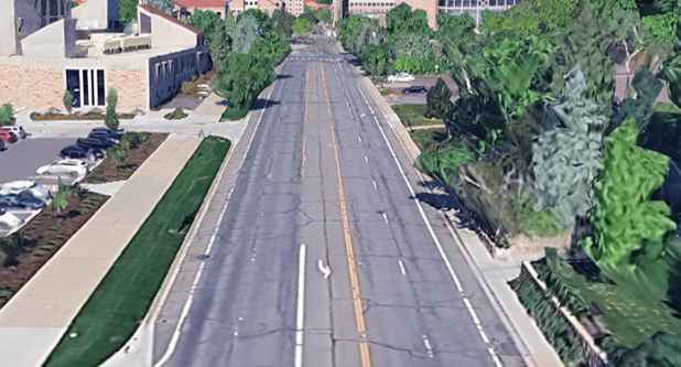 Colorado Avenue shown before 2025 mobility enhancements with painted bike lanes in each direction, two vehicle lanes in each direction, and turn lanes at the Folsom St and Regent Dr intersections.