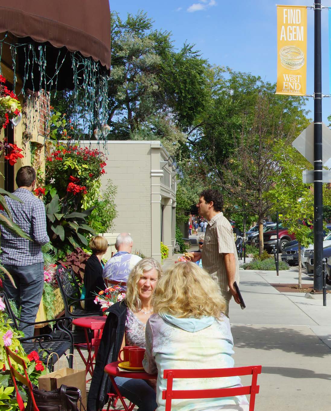 Community members enjoy outdoor dining in downtown Boulder