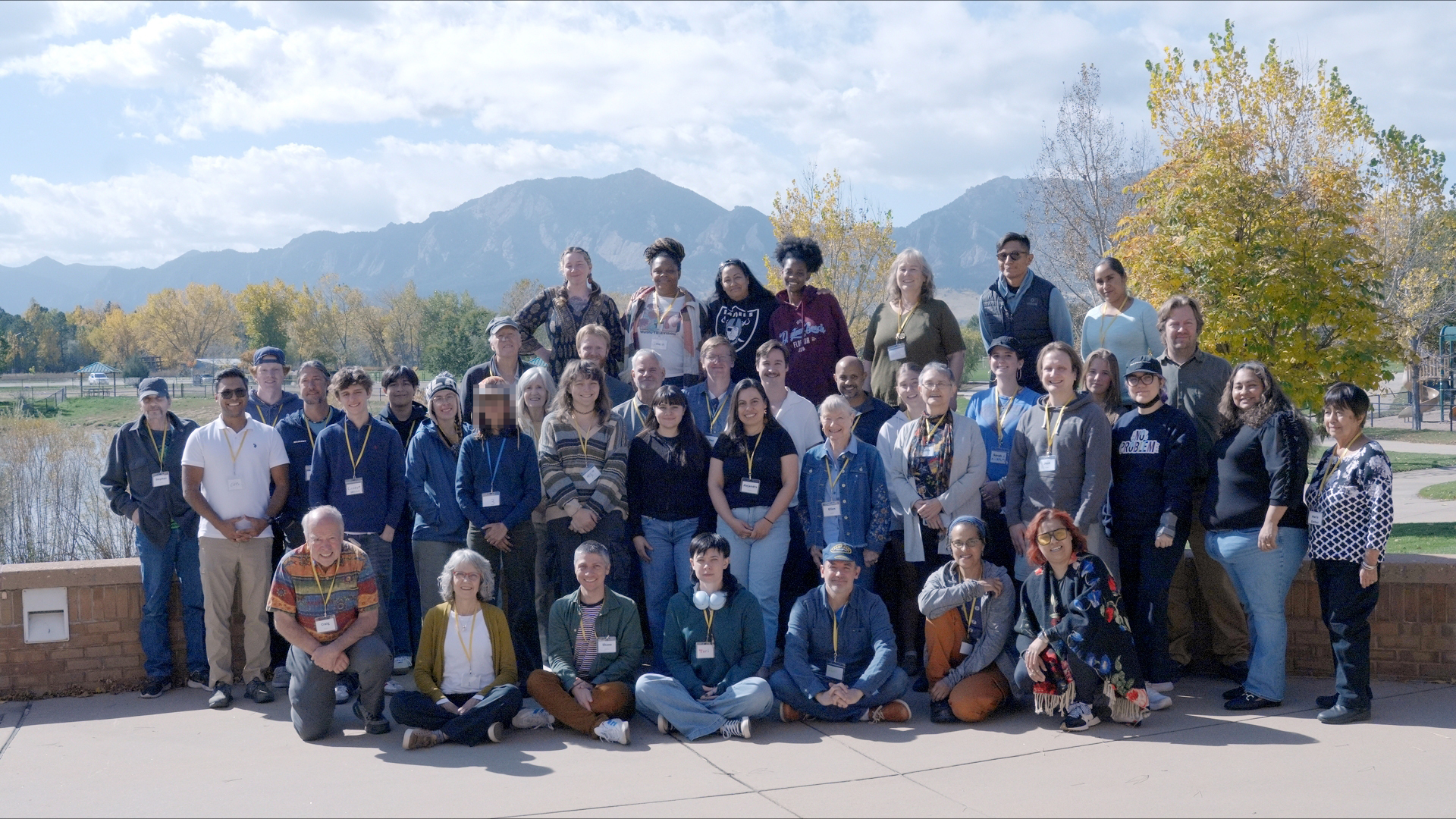 Group photograph of a diverse group of people. 