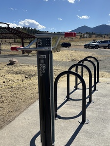 Bike rack and fix it station at trailhead