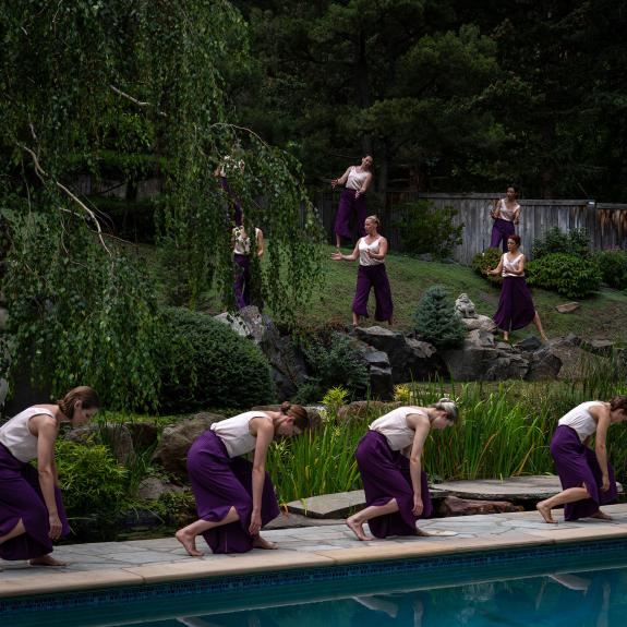Dancers performing in an immersive nature environment