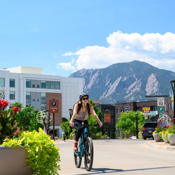 Biker riding through Boulder Junction