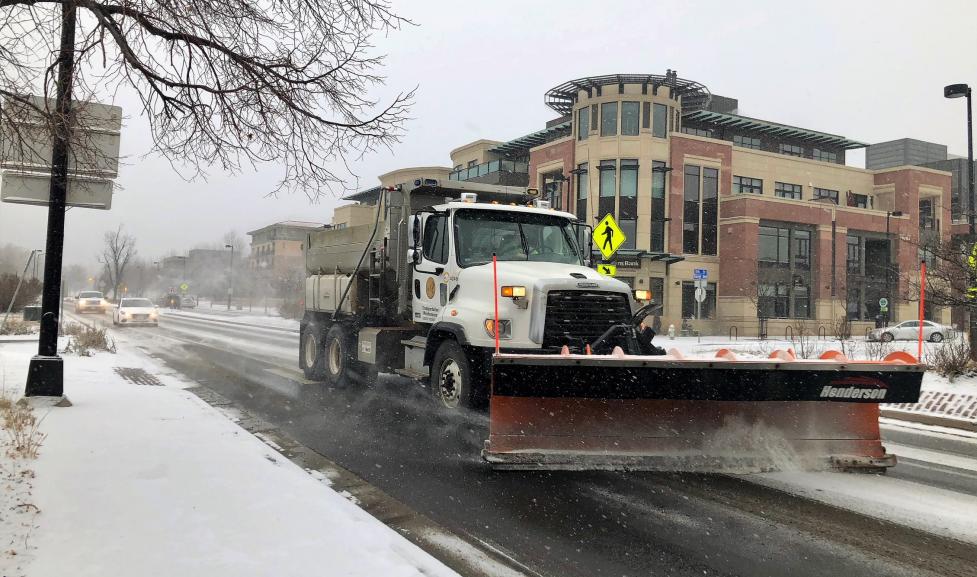 Boulder snow plow clearing the road