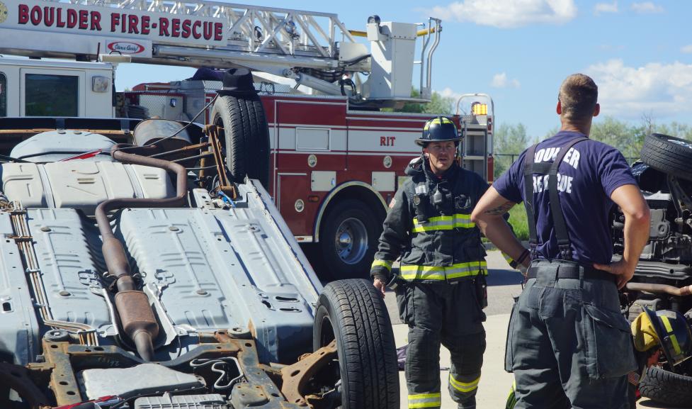 Firefighter training with mock car crash