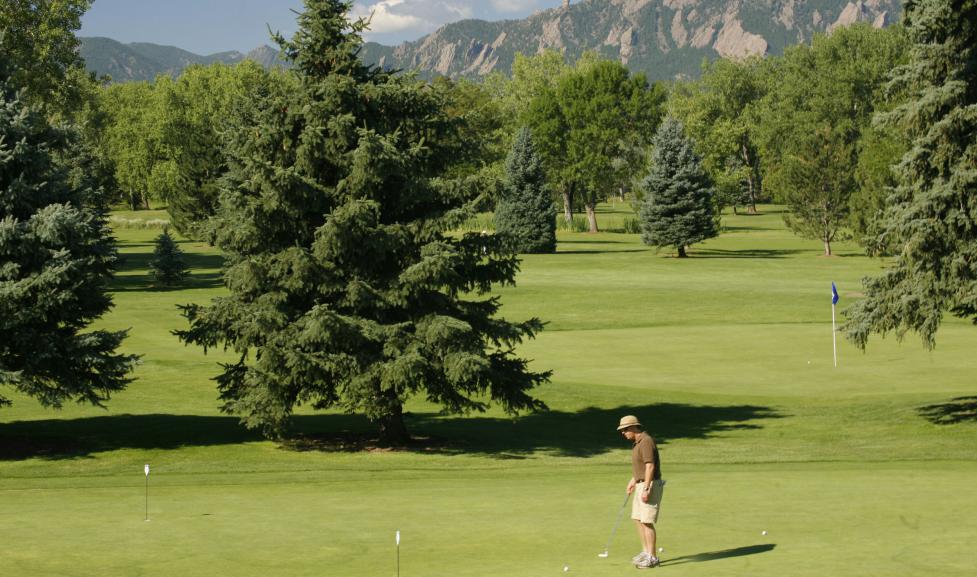 Golfer at the Flatirons Golf Course