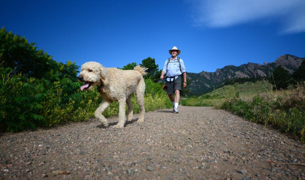 Man hiking with his dog