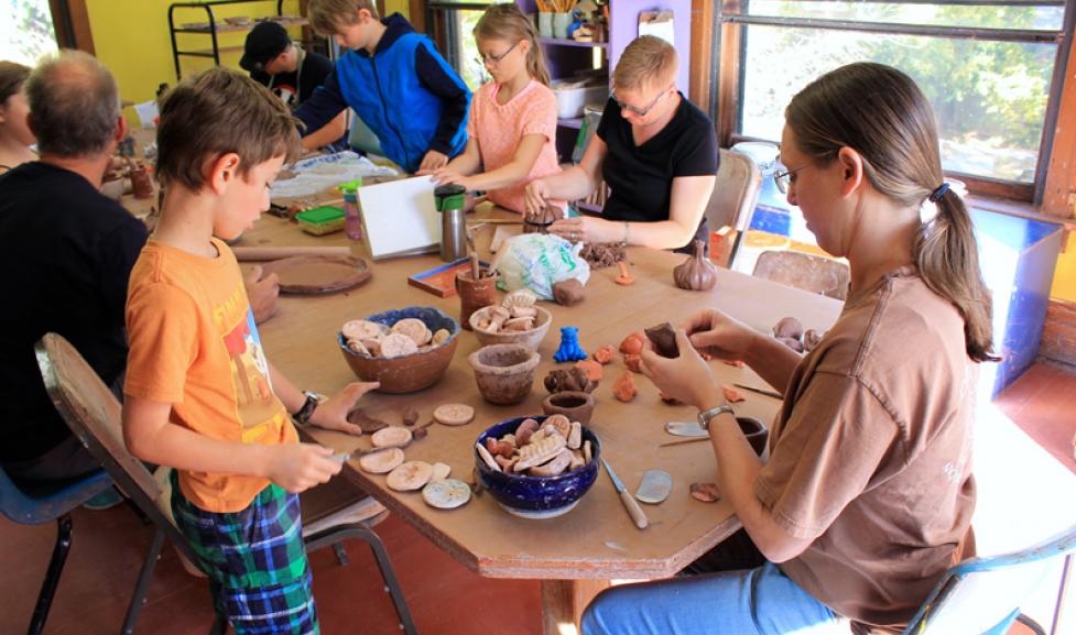 Kids taking a pottery class at the Pottery Lab