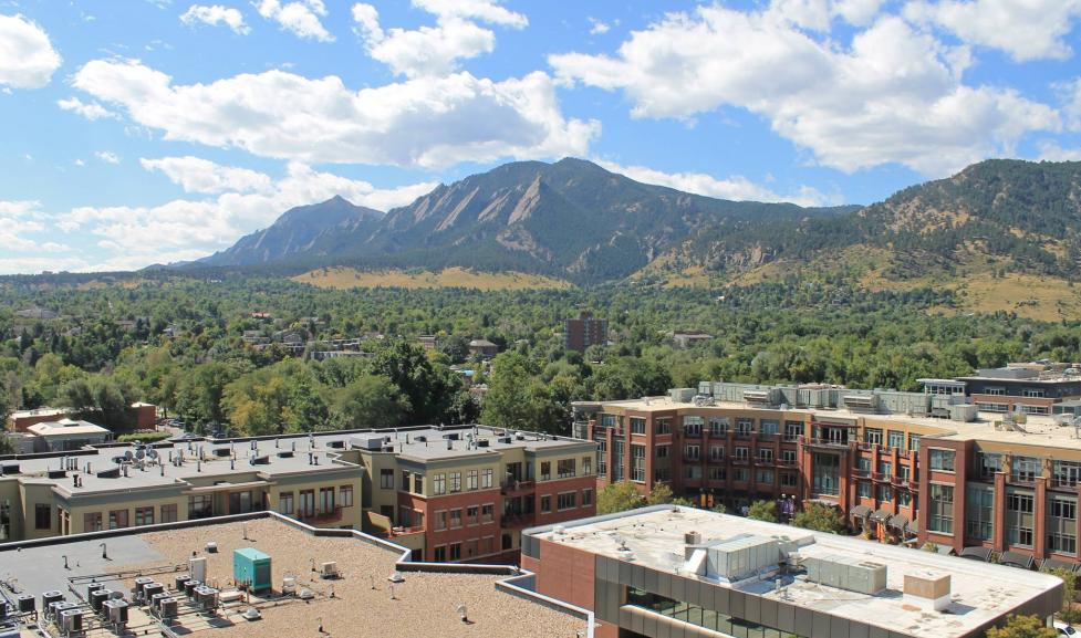 View of Boulder Flatirons from downtown Boulder rooftop