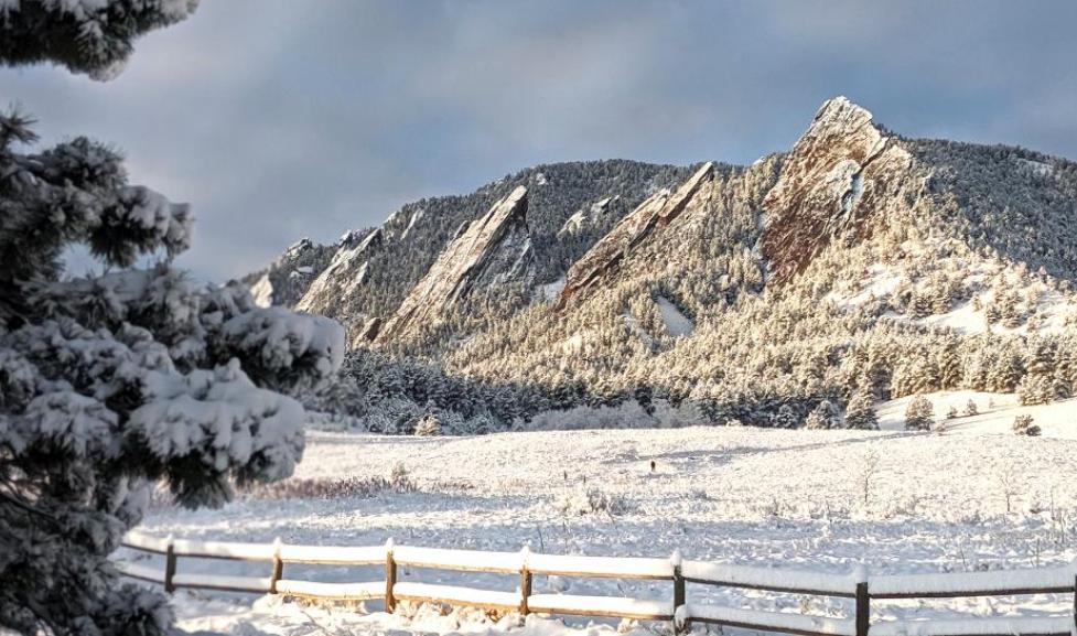 snow covering the flatirons on a wintry day