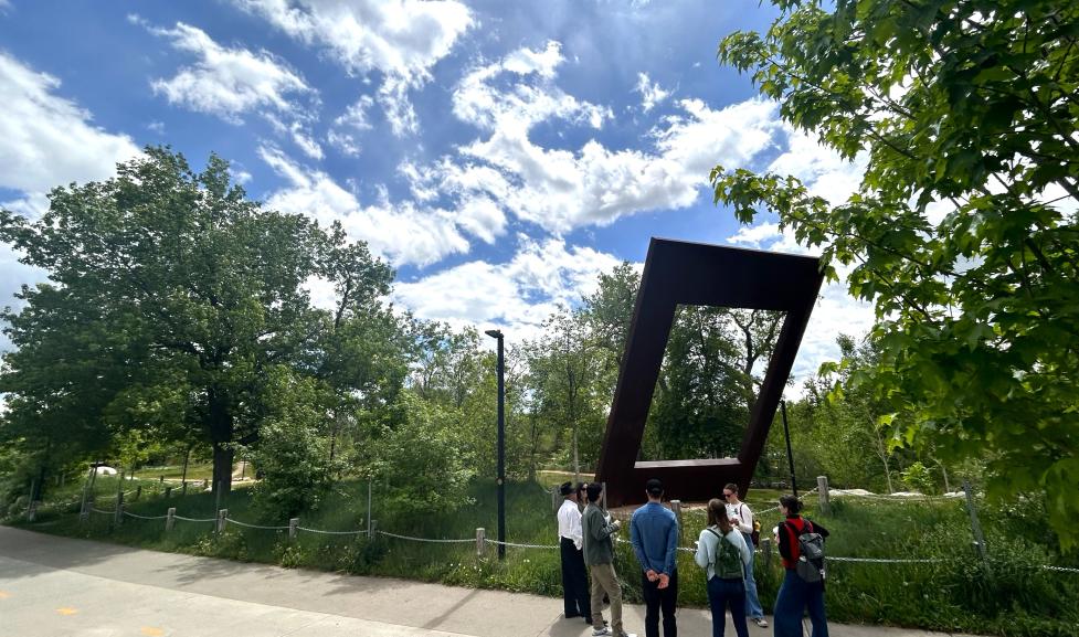 Group of people on a public art tour in the Civic Area