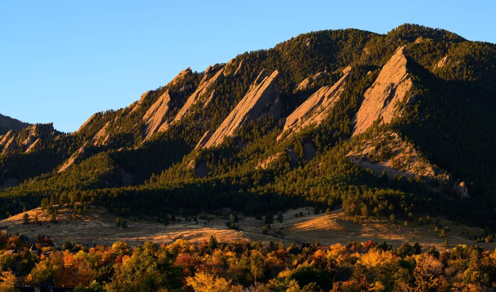 Boulder's Flatirons with fall foliage