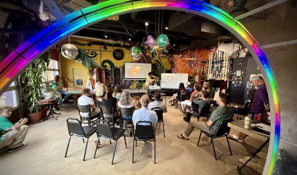 Artists gathered to listen to a speaker