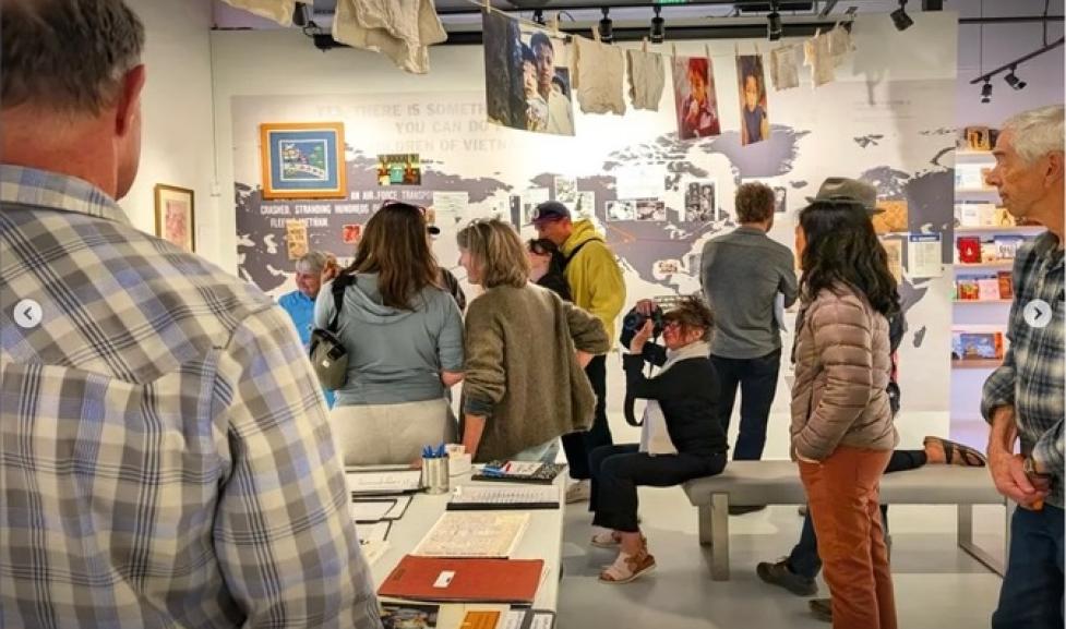 Attendees of a gallery event mingling