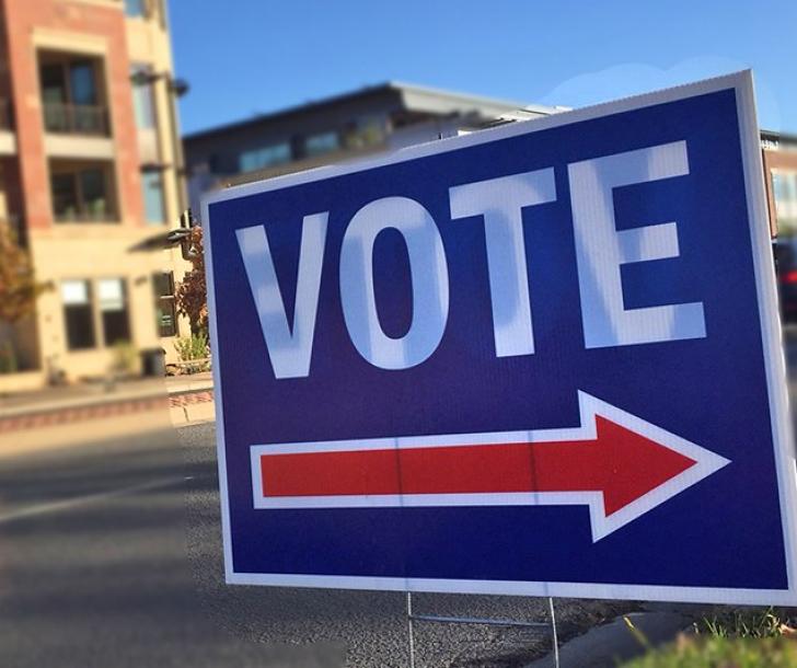 Image of vote sign outside 