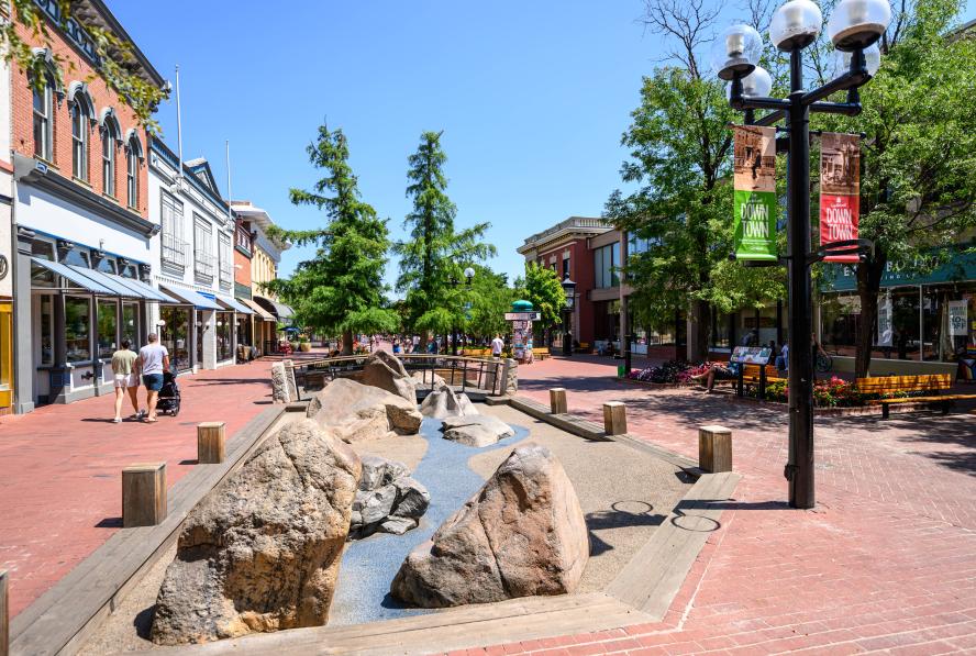1200 block of the Pearl Street Mall with rock play structure
