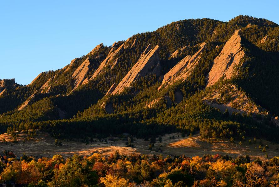 Boulder's Flatirons with fall foliage