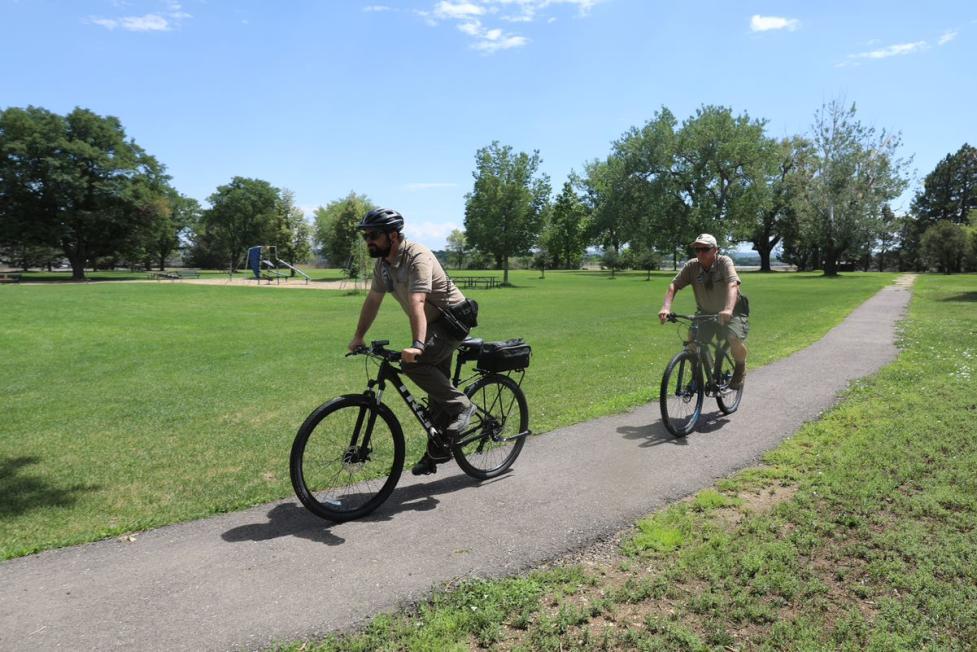 Parks and Recreation rangers on bicycles
