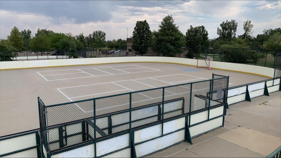 Lines for 2 pickleball courts are painted on one half of the big rink at Foothills Community Park.
