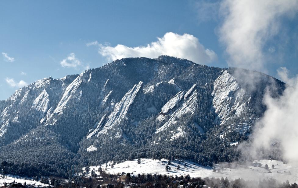 Boulder's flatirons covered in snow