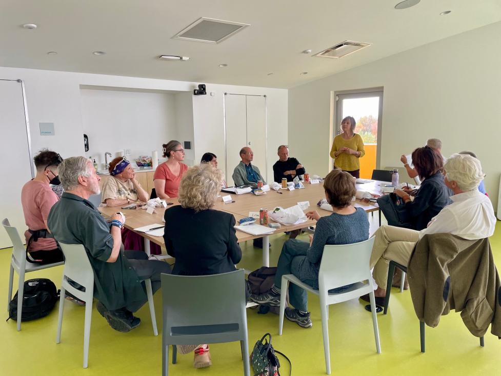 Focus group participants listening to a facilitator