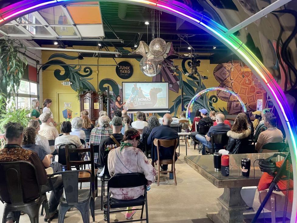 Artists gathered to listen to a speaker