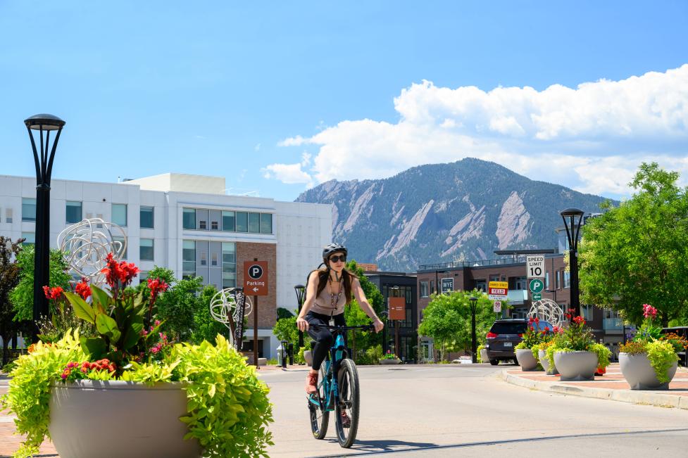 Biker riding through Boulder Junction