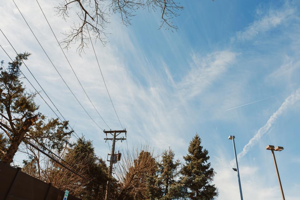 Power lines against a clear blue sky