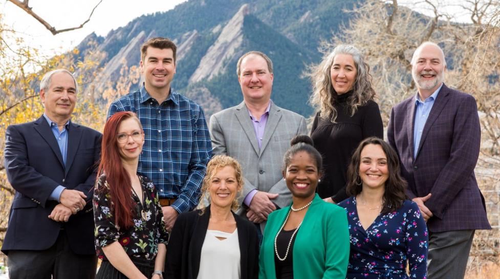 Group photo of Boulder City Council with Flatirons in background