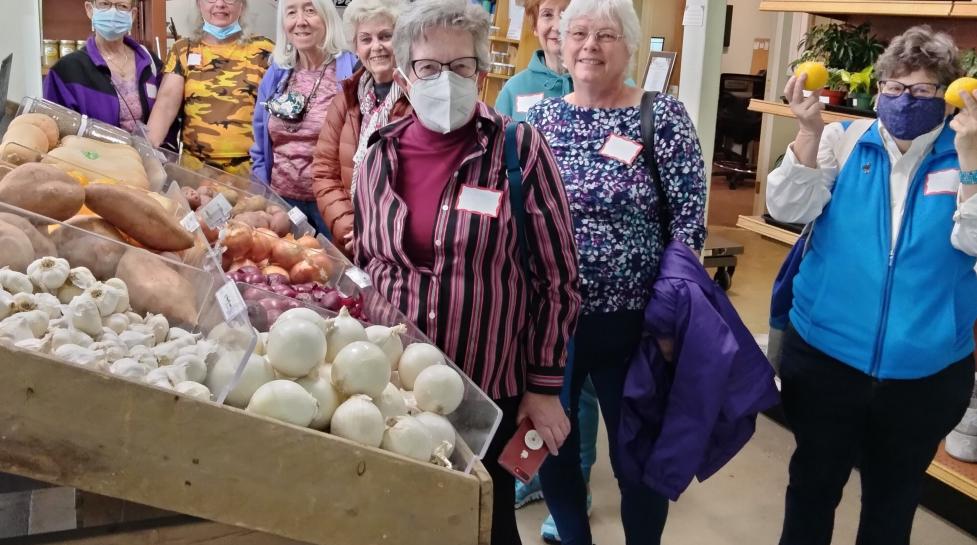 Older adults touring Nude Food Market