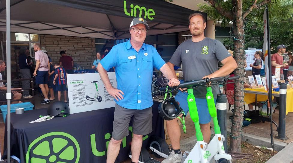 Lime scooters at an outreach booth