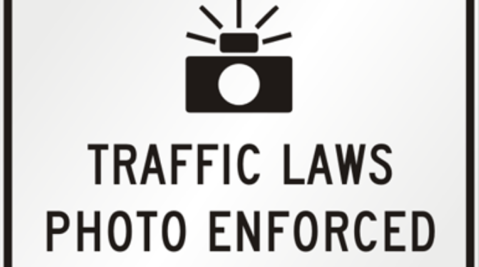 Traffic sign with words Traffic Laws Photo Enforced 