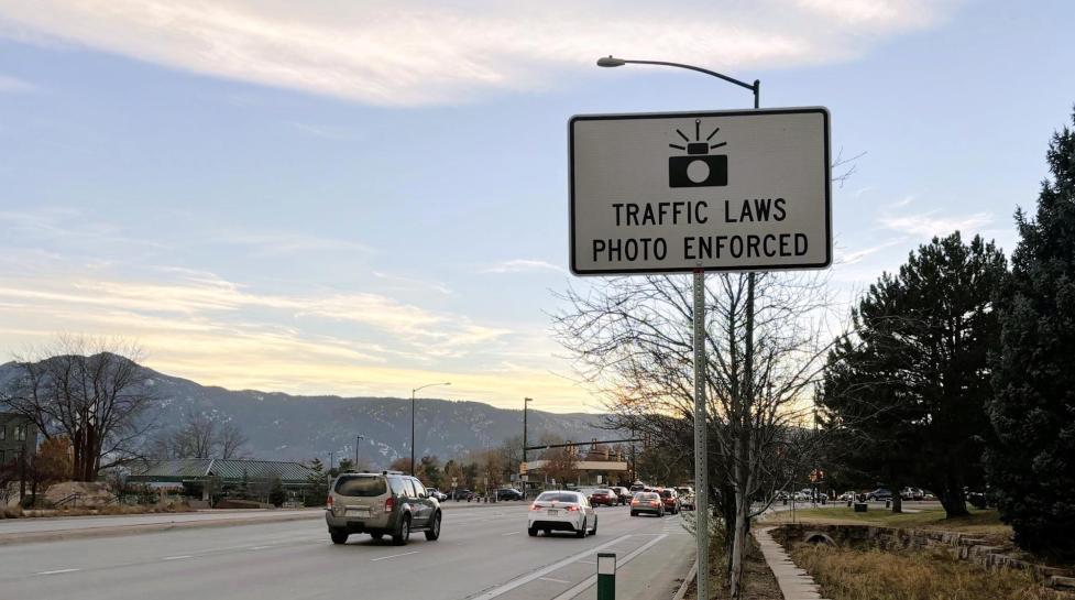 Example automated traffic enforcement sign on Iris Avenue