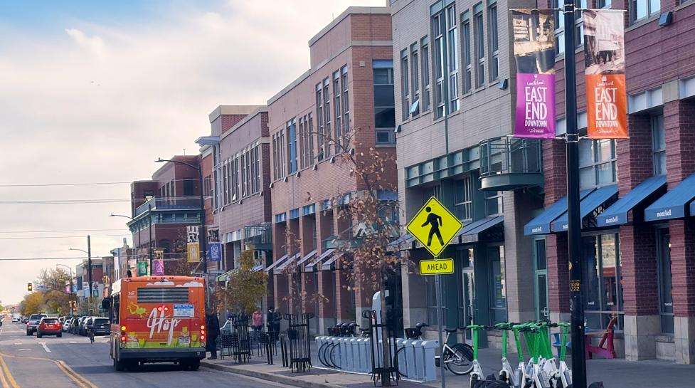 hop bus near e-scooter parking and e-bikes downtown