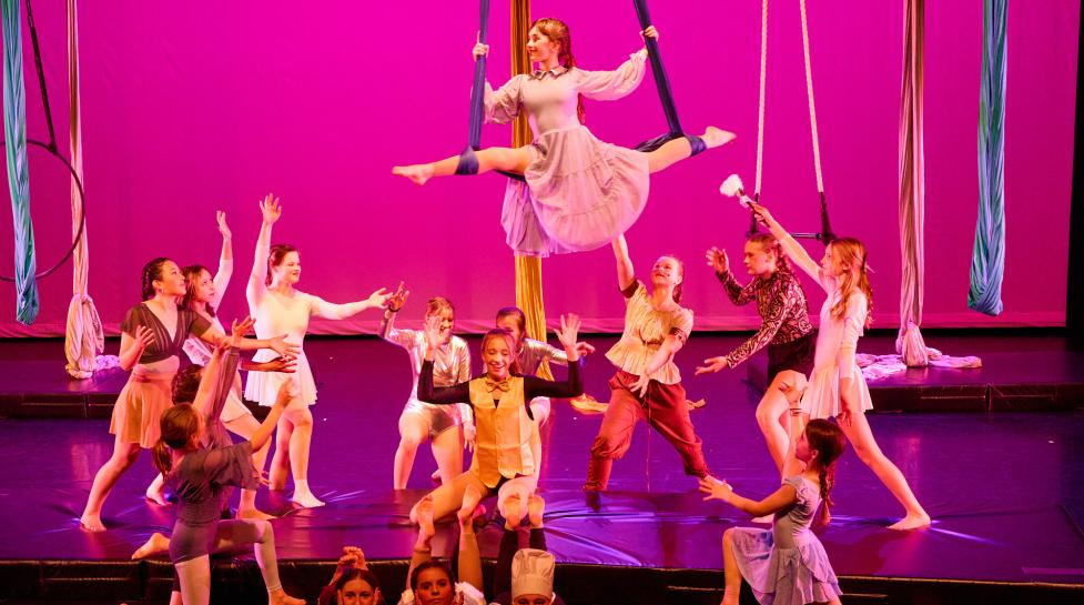 Aerial dancers performing on stage