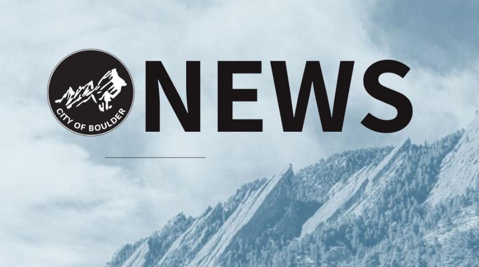 Flatirons with News in the foreground