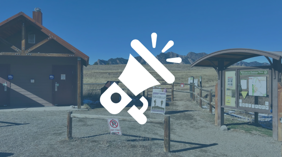 Trailhead with bathrooms and kiosk with map and information