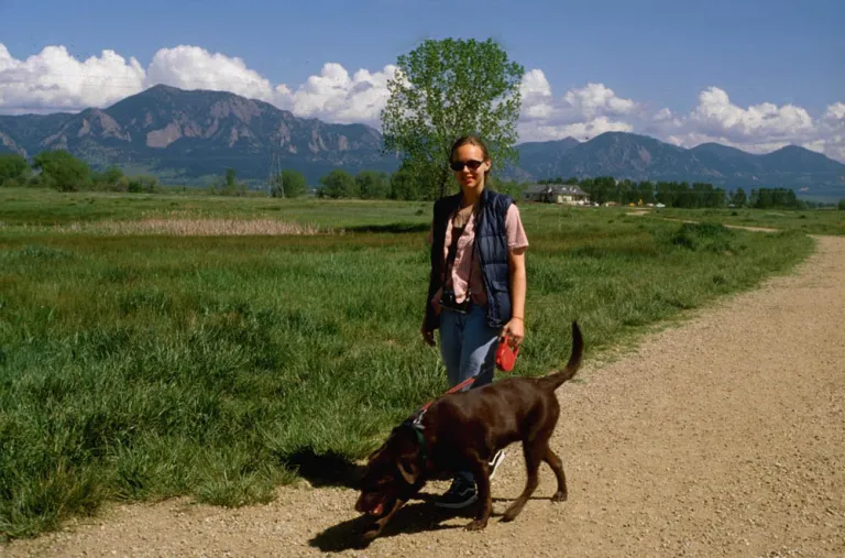 Woman hiking with her dog