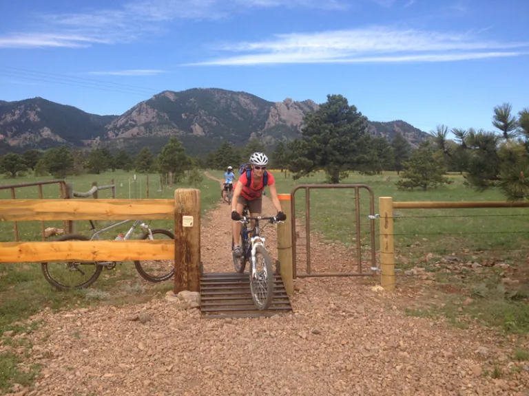 Biker using cattle guard ramp