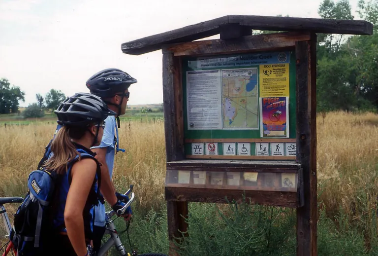 Visitors at Bobolink Trailhead reg board